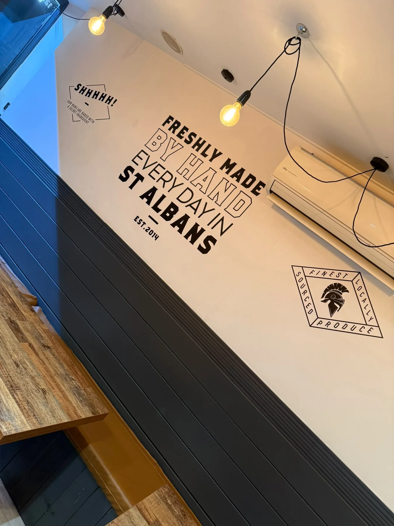 Original Meating Room interior wall lettering celebrating St Albans